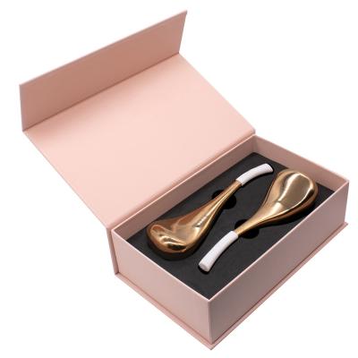 China Face Body Neck Feet Massage Rose Gold Ice Roller Cryo Facial Stick for sale