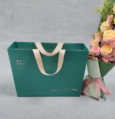 China Custom Luxury Gift Garment Paper retail shopping bags for sale