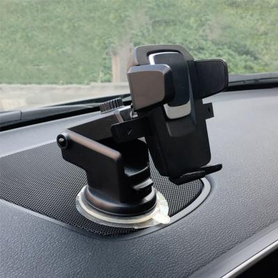 China New Mobile Phone Car Bracket Adjustable Multifunctional Gravity Suction Cup Suction Cup Navigation Bracket Telescopic Bracket for sale