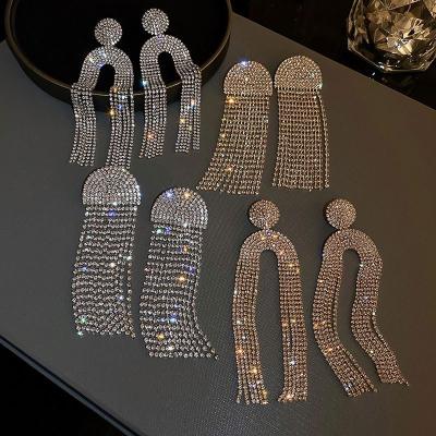 China Trendy Fashion Statement Geometric Rhinestone Earrings Large Evening Diamond U Shape Long Tassel Earrings for sale