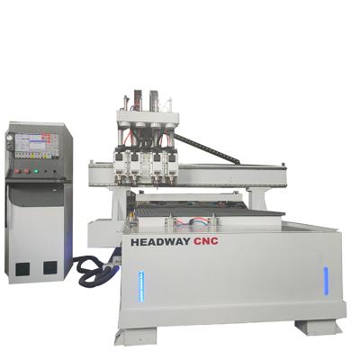 China 4 Axis MDF WOOD ACRYLIC ALUMINUM CNC Router 1325 with ATC vacuum table for cabinet making for sale