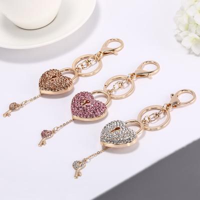 China Hot Selling METAL LOVE Diamond Shape Diamond Key Chain Lock Key Dangle Wholesale Custom Jewelry For Women for sale