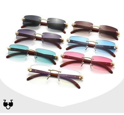 China Fashional new fashion sunglasses men's rimless balance sunglasses wood grain temple trend marine glasses for sale