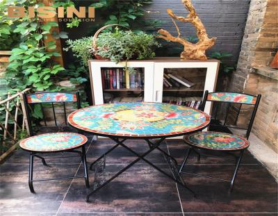 China Folded landscape colorful kid's garden or iron and round mosaic balcony table with chair for sale