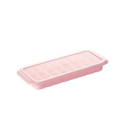 China Sustainable Food Grade Silicone Ice Cube Trays With Bin For Freezer With Lid Suitable For Family Parties Bars for sale