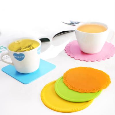 China OEM DreamColor 4 PCS Silicone Viable Cute Tripod Coasters Heat Resistant Place Mat for sale