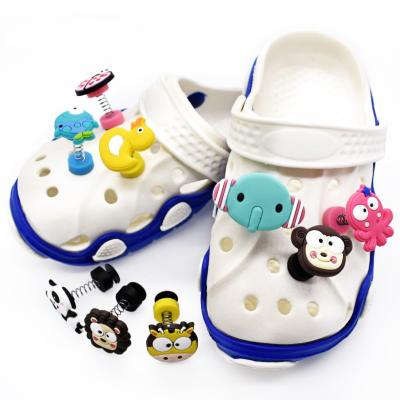 China Shoe Buckle Stock Lovely Ducks Monkey Shaped Spring Wave Shoe Charm PVC Soft Shoe Decorative Charm for sale