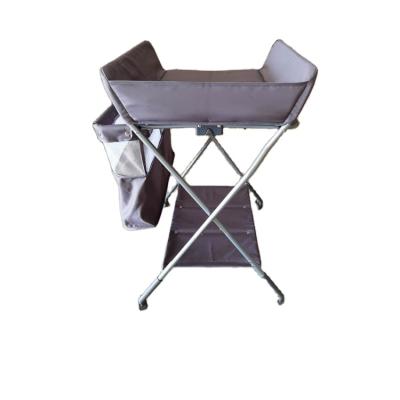 China Luxury Foldable Baby Diaper Table With Wheels Folding Portable Changing Table for sale