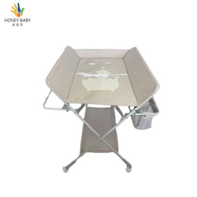 China Four Wheels Portable Baby Massage Foldable Comfortable Folding Changing Table With Bathtub for sale