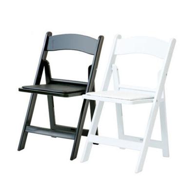 China Outdoor Plastic Resin Chair Event Black White Wedding Picnic Folding Chairs for sale