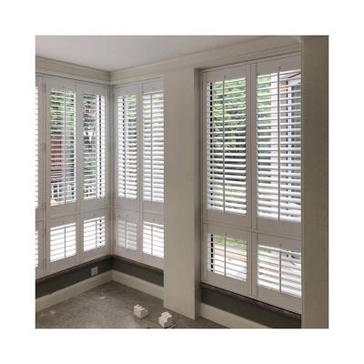 China Modern Basswood Composite 63.5 Mm Plastic Door Plantation Shutter for sale