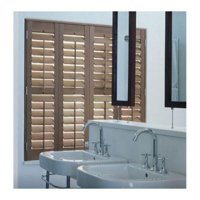 China Environmental Friendly Decorative Interior Hinged Wood Stained Plantation Window Shutters for sale