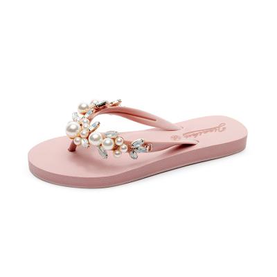 China High Quality Rubber Flat Metal Slipper Ladies Eva Button Flip Flops Plastic Slippers Fashionable Anti Slippery Flip Flops for sale