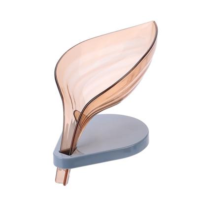 China Modern Leaf Shape Bathroom Kitchen Sponge Holder Multifunctional Flowing Soap Holder for sale