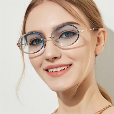 China Luxury Women Oval Rimless Sunglasses For Designer China Vendor 2000s Vintage Gold Female Shades Hot Fashionable Oval Metal Frame Small for sale