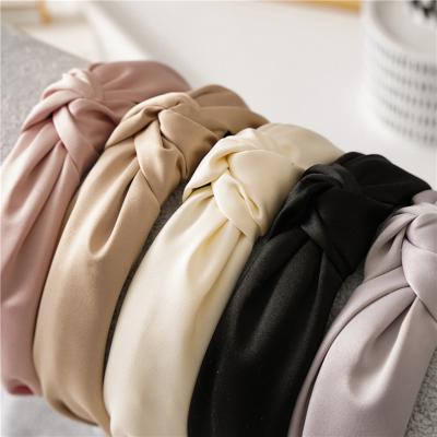 China Simple Knotted Women's Side Circle Cloth Headband Girls Hair Circle Hair Accessories Solid Color Head Band Twisted Wide Headband Environmentally Friendly for sale