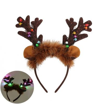 China Environmentally Friendly Elastic Feather Hair Band Cartoon Elk Elk Antlers Christmas Glowing Cute Animal Headband for sale