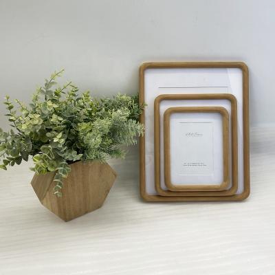 China Contemporary wholesale handmade paper wood photo wall frames for photos picture home dector for sale