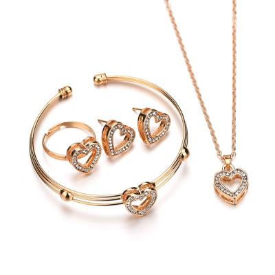 China 4Pcs/Set Trendy Heart Shaped Jewelry Set Women Gold Color Ring Sets Jewelry Crystal Diamond Necklace Earring Bracelet for sale