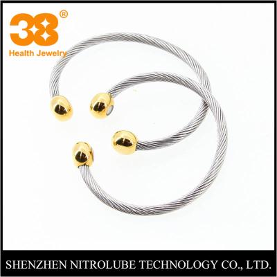 China Magnetic Arthritis Pain Relief Fashion Bangle Adjustable Stainless Steel Coil Bracelet for sale