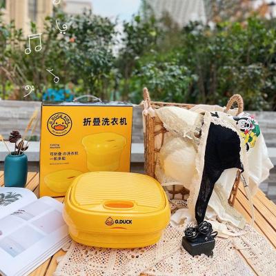 China New design duck small mini travel washing machine foldable warm yellow househ automatic hotel portable washing machine for sale