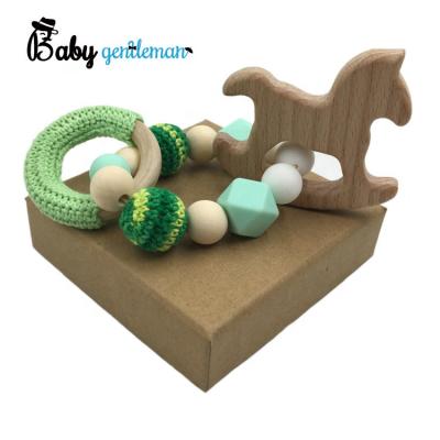 China Silicone Baby Snacking Toy Hook Solid Wooden Organic Wooden Teether Bracelet For Baby Z08278K for sale