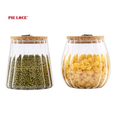 China Sustainable New Design High Borosilicate Wave Glass Storage Food Jar With Bamboo Lid Eco-friendly for sale