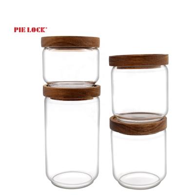 China New Trend Sustainable Food Safe Storage Glass Jar With Acacia Wood Lid Glass Jar For Kitchen for sale