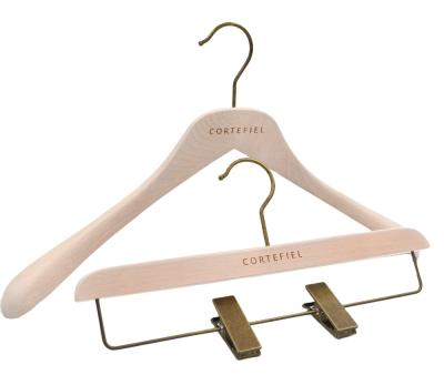 China Eco-friendly Luxury Classic Style Golden Wooden Hangers Staples Wood Hanger With Logo for sale