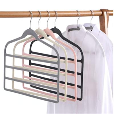 China 4 Row Pink Gray Non-Slip Surface Perfect Closet Organizer Velvet Pants Traditional Hangers for sale