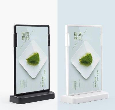 China Lightweight And Durable Plastic A4 T Shape Table Menu Sign Board Holder Stands For Restaurants Stores for sale