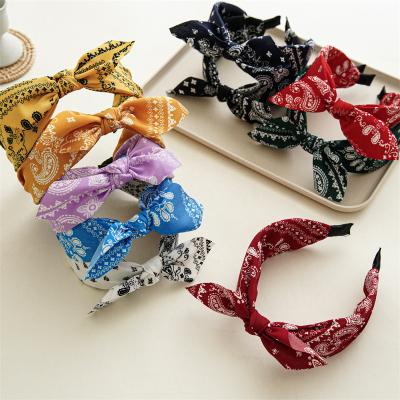 China Hao Han Wholesale Cashew Flowers Fashion Hair Scrunchies Women Rabbit Ears Hair Circle Elegant Cloth Headwear Wide Headband Scrunchie Headband for sale