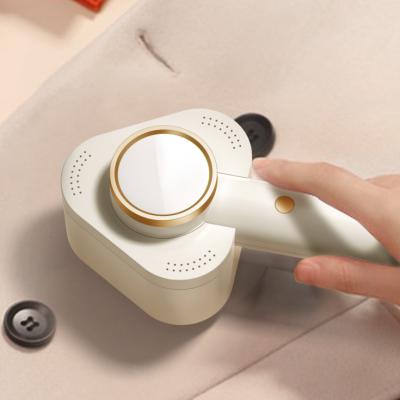 China Viable Automatic Electric Fiber Remover For Clothes Sweater Woolen Overcoat Portable Fiber Remover for sale