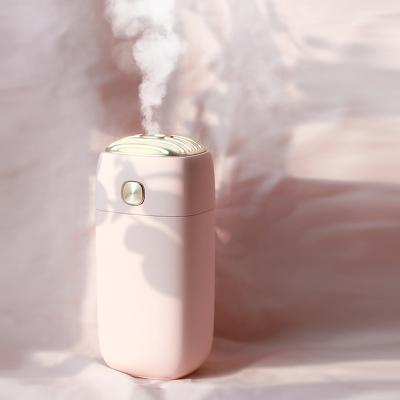 China USB Charging Simple Design Mini Sprayer White Pink Green DC5V USB Humidifier 800mAh Small Sensitive Humidifier For Girls for sale