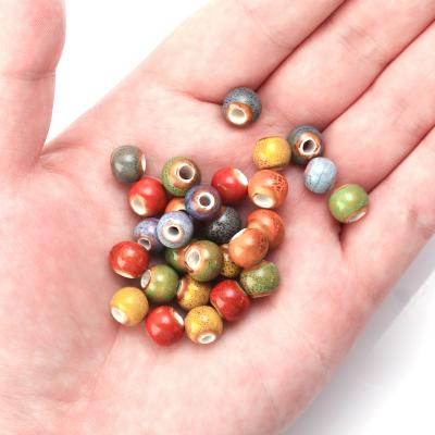 China Retro Ceramic Jewelry Ceramic Beads , Handmade Pottery Porcelain Round Beads For Jewelry Making for sale