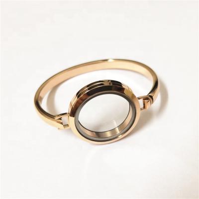 China Cute Stainless Steel Metal Rose Gold Color Round Screw Shape Memory Pendant Waterproof Floating Glass Bracelet for sale