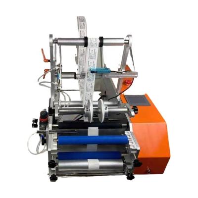 China Semi Automatic Manual Food Instruction Folding Paper One Label C Envelope Sticker Sealing Labeling Machine for sale