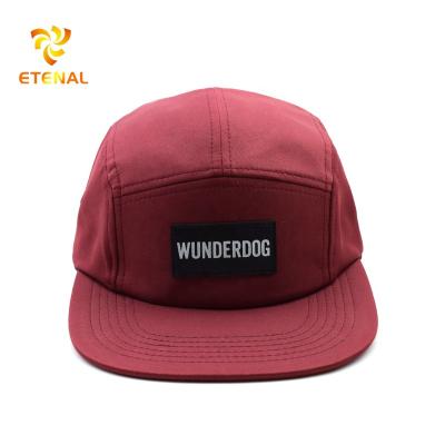 China JOINT Custom Red Flat Snapback 5 Panel Nylon Hat With Leather Patch Logo for sale