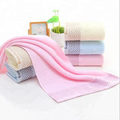 China High Quality Compressed Cotton Towel Soft 100% Plain Dyed Woven Face Towel for sale