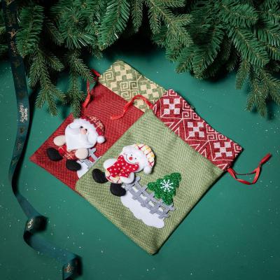 China Festive parties Christmas decoration red and green Christmas gift drawstring bag for sale