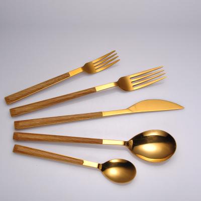 China Sustainable Stainless Steel Flatware Set Cutlery Set With Patter Wood ABS Handle Family Dining Table Uses A Five-Piece Set for sale