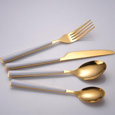 China Sustainable Stainless Steel Flatware Set Cutlery Set With ABS Handle Black And White Mirror Polished Dinnerware Set for sale