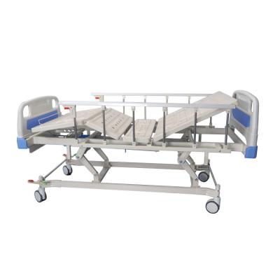 China Manual Easy Operate With Wheels Can Be Raised And Lowered Stainless Steel Guardrail Triple Function Manual Hospital Bed for sale