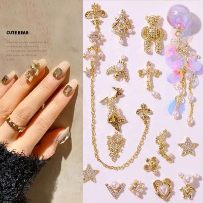 China Art Decoration Zircon Shiny Crystal Gold 3D Tassel Nail Dangle Nail Art Decorations Metal Butterfly Full Bear Nail for sale