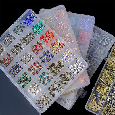 China Nail Art Decorations Mixed 24 Grid Alloy Nail Art Jewelry Color Rhinestone Gem Aurora Bow Nail Decoration Accessories High Quality for sale