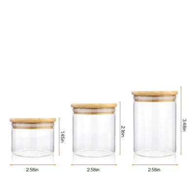 China Freshness Keeping 2 Ounce Glass Jar Glass Jars With Wood Lid Glass Candle Jar for sale