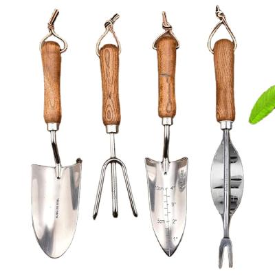 China Portable Multifunctional Wooden Handle Household Gardening Tool Planting Wood Handle Mini Customized Garden Rake Tool Set for sale