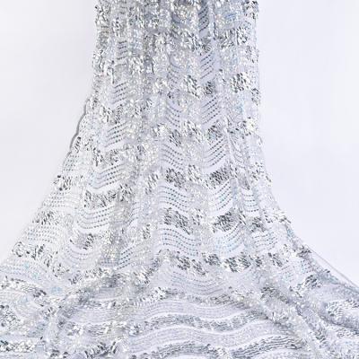 China Other Design Custom Embroidery 100% Polyester Silver Wave Tulle Sequin Lace Fabric For Girls Dress for sale