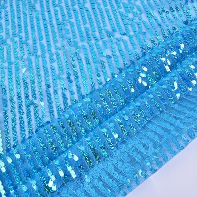 China Custom Blue Other Color Embroidery Mermaid Sequin Net Lace Fabric For Kids Dress Decor for sale