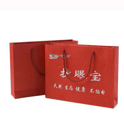 China Recyclable In Stock Bolsa De Papel Personalizada Packaging Custom Logo Printed Paper Shopping Bag for sale